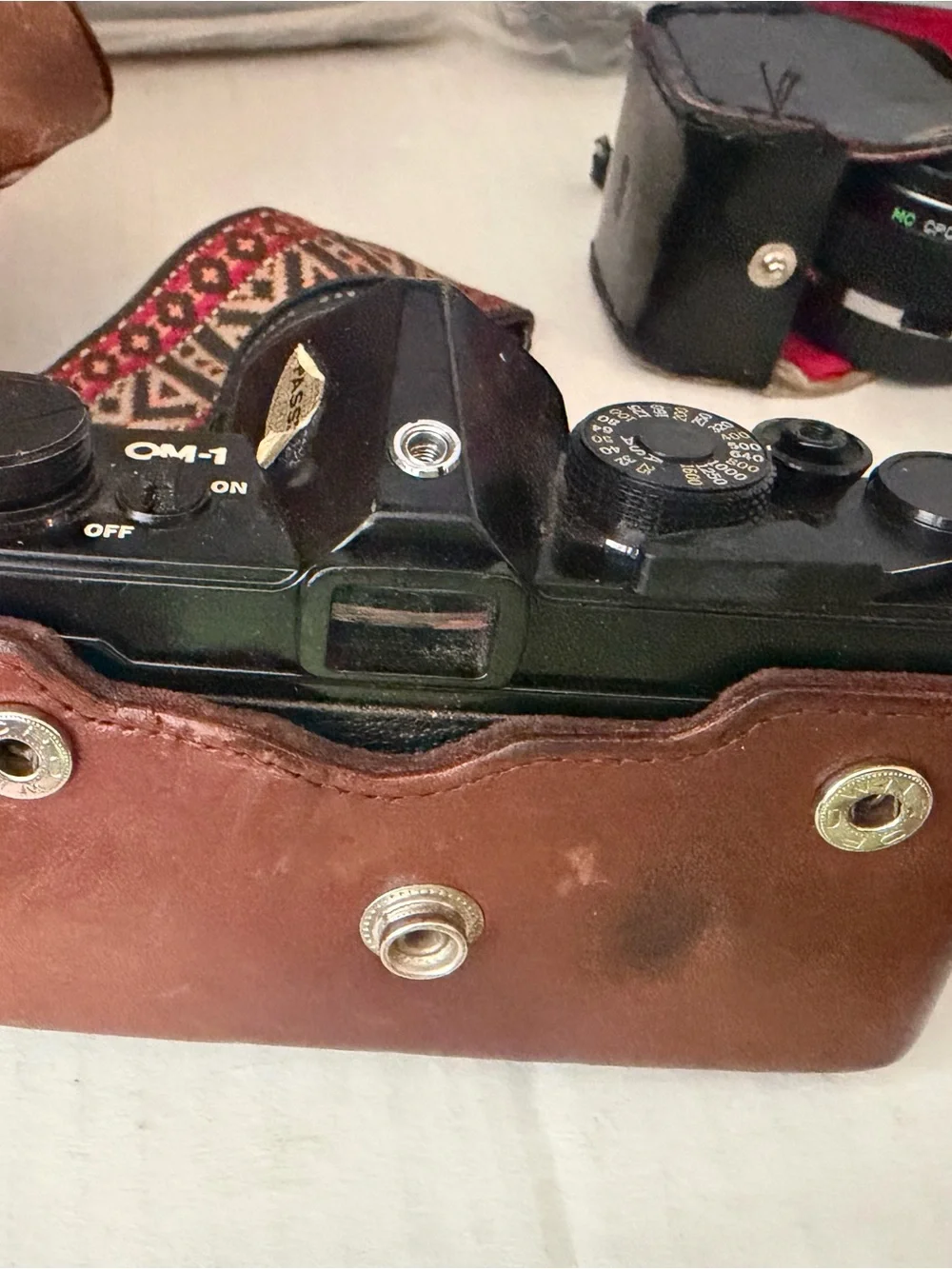 Olympus OM 1 SLR film camera with Original Leather  Case and Accessories